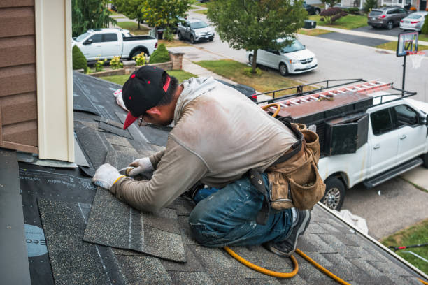 Professional Flat Roof Repair technician working in Lansing, IA
